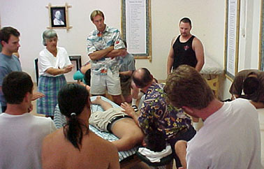 Professor Robert Hudson teaching massage class